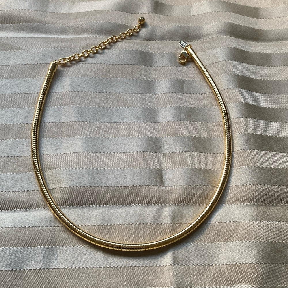 Joan Rivers Round Omega in Gold Tone